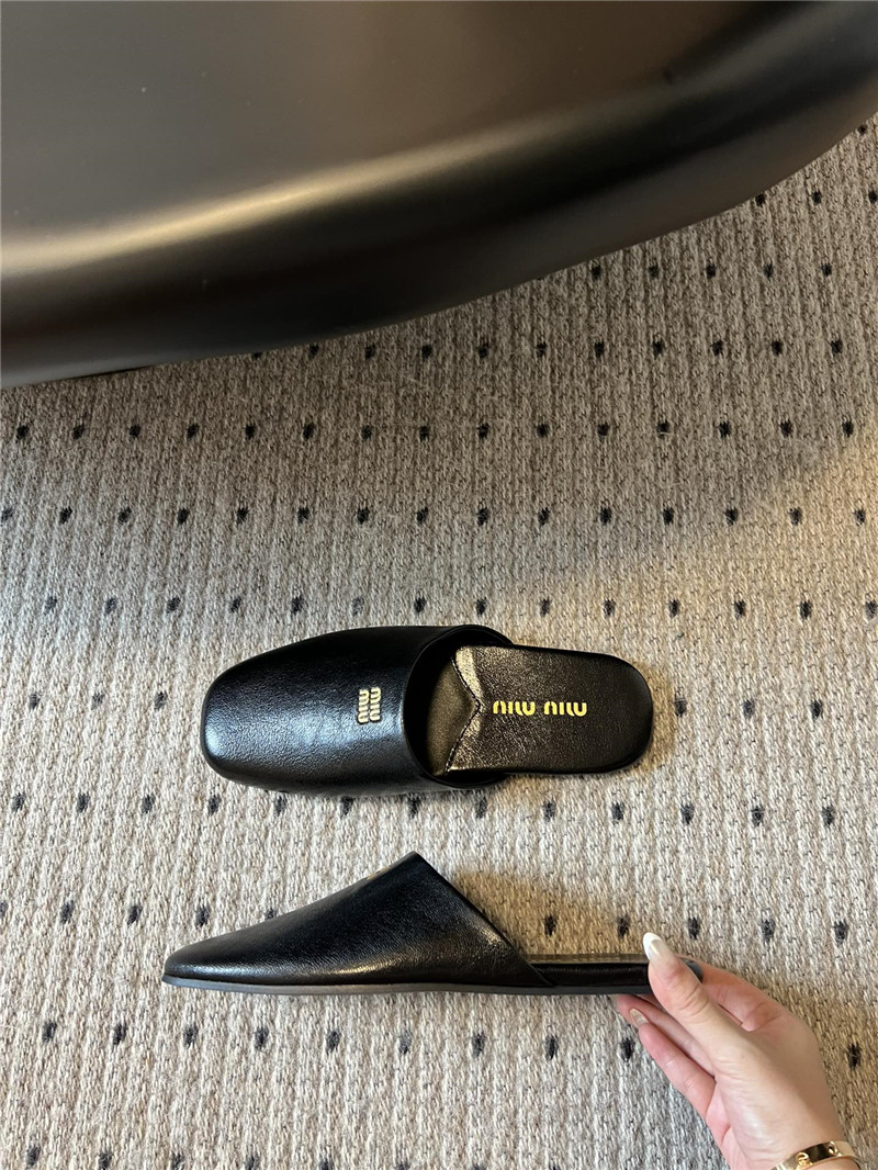 Miu Miu Black Leather Slippers with Embossed Logo