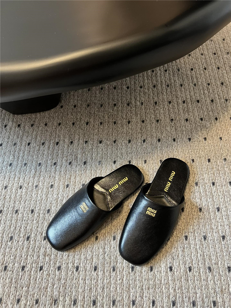 Miu Miu Black Leather Slippers with Embossed Logo