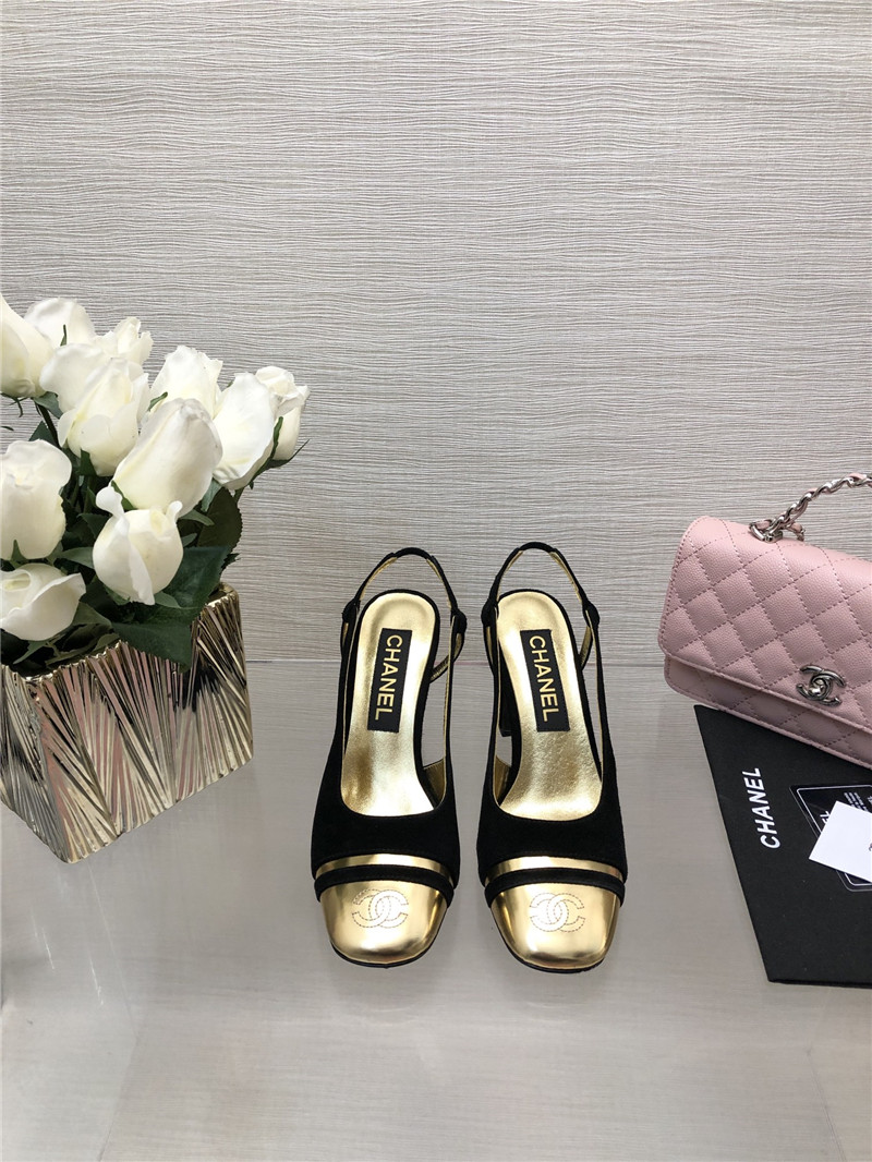 Ch**el black suede and gold leather slingbacks
