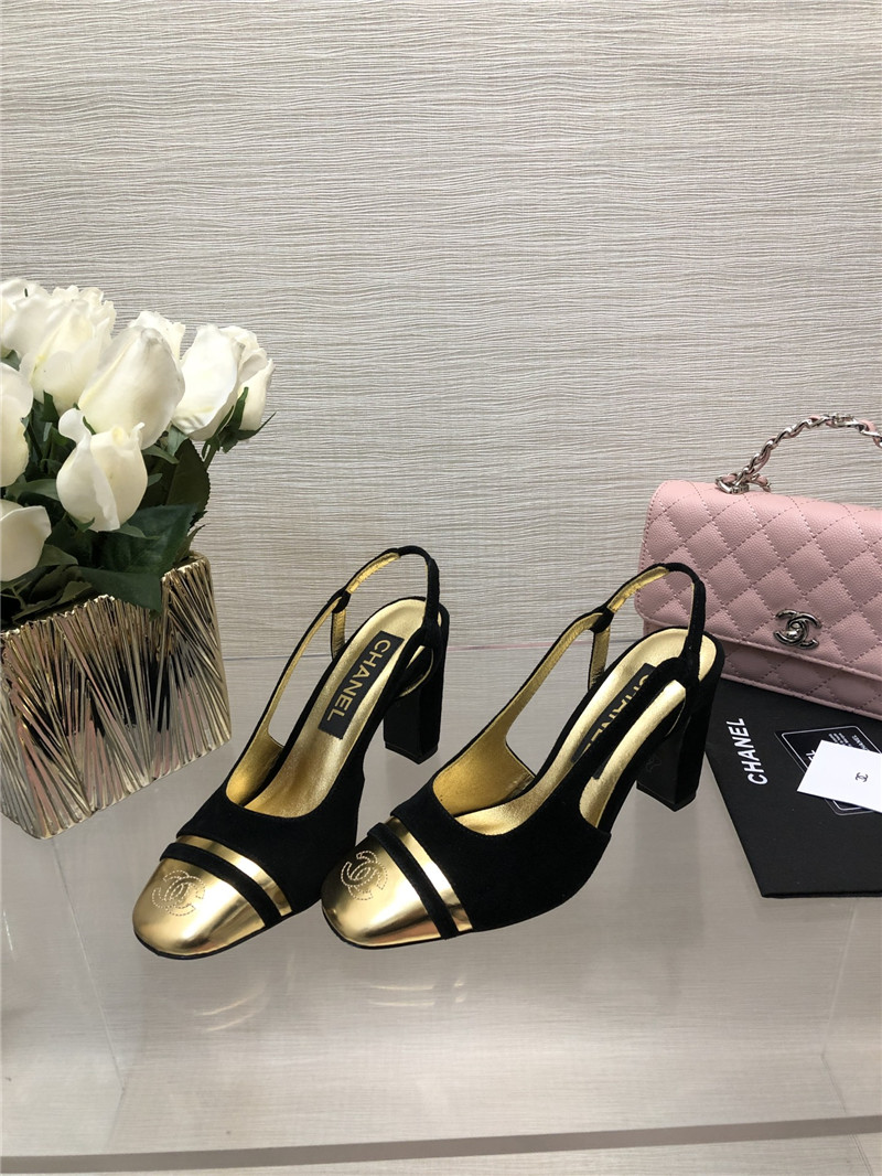 Ch**el black suede and gold leather slingbacks