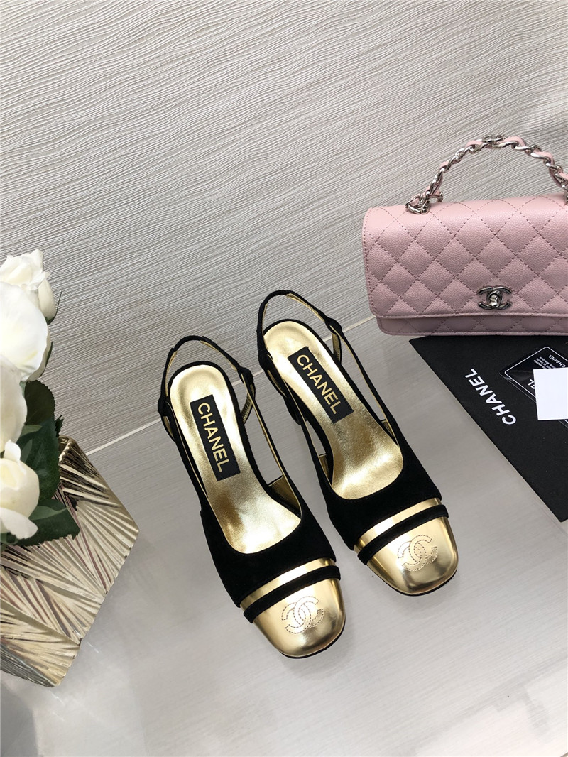 Ch**el black suede and gold leather slingbacks