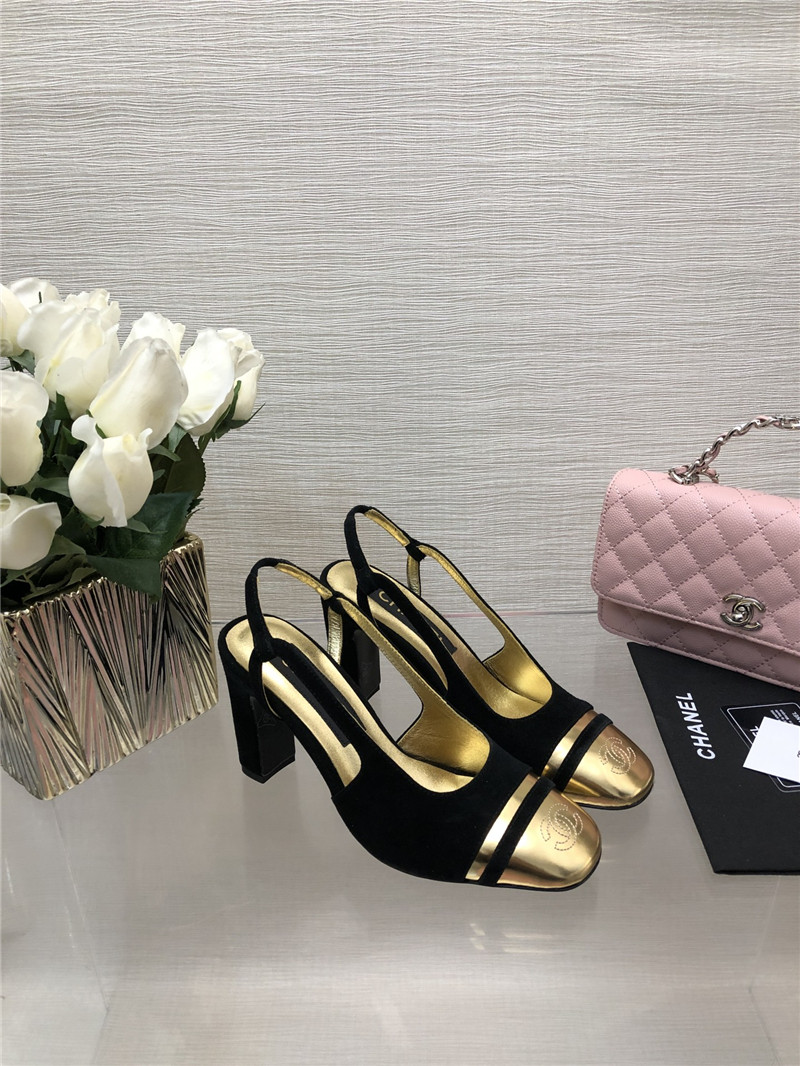 Ch**el black suede and gold leather slingbacks