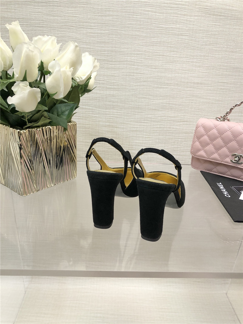 Ch**el black suede and gold leather slingbacks