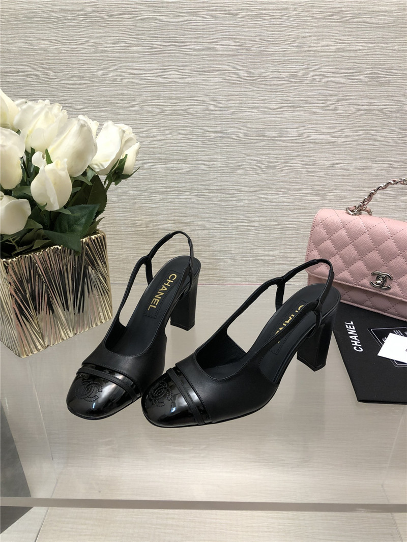 Ch**el black goatskin and patent leather slingbacks