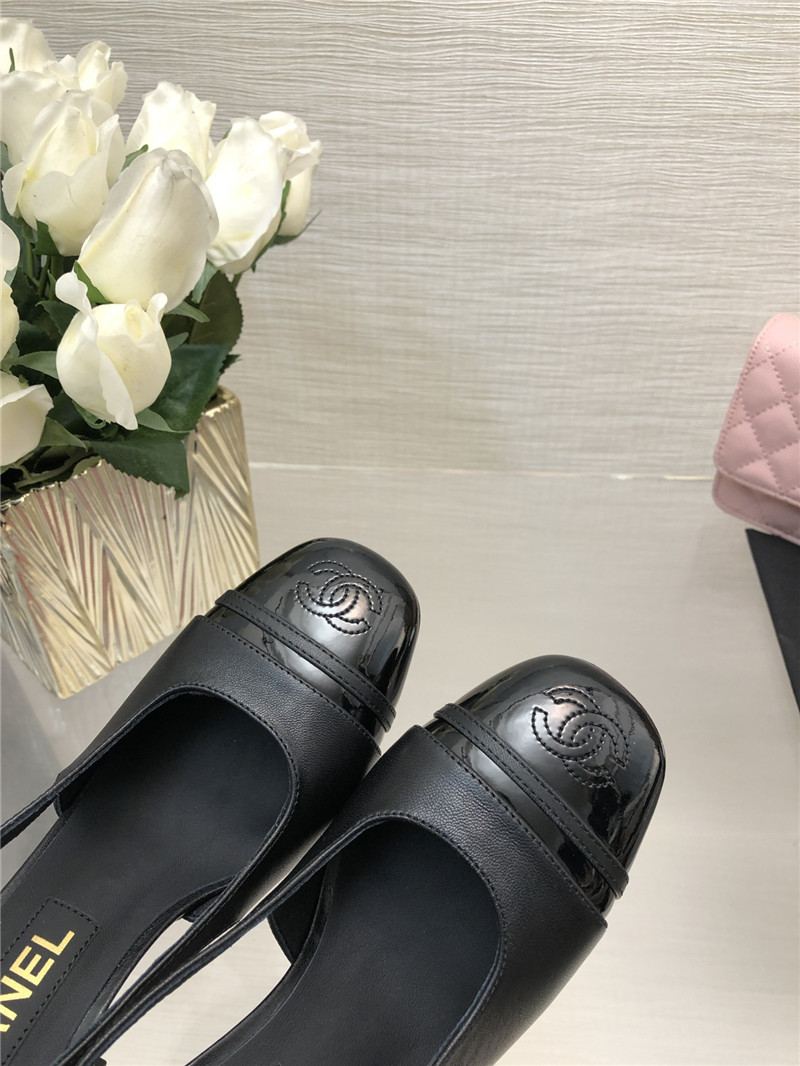 Ch**el black goatskin and patent leather slingbacks