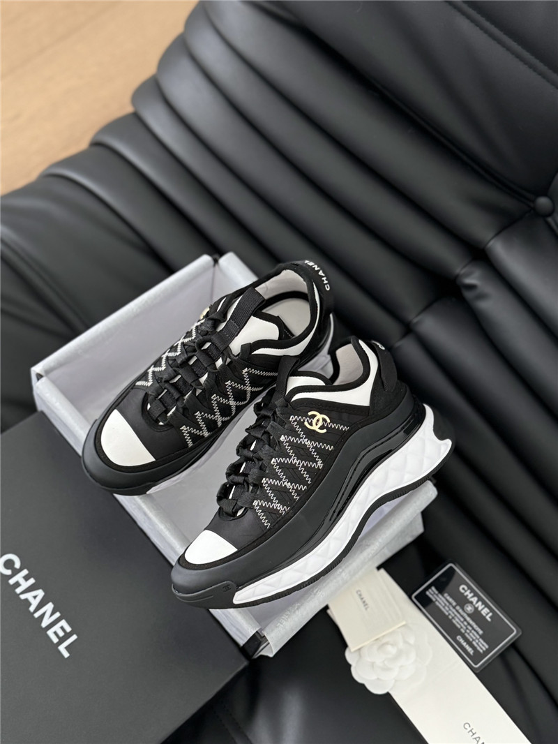 Ch**el logo suede calfskin sneakers in black