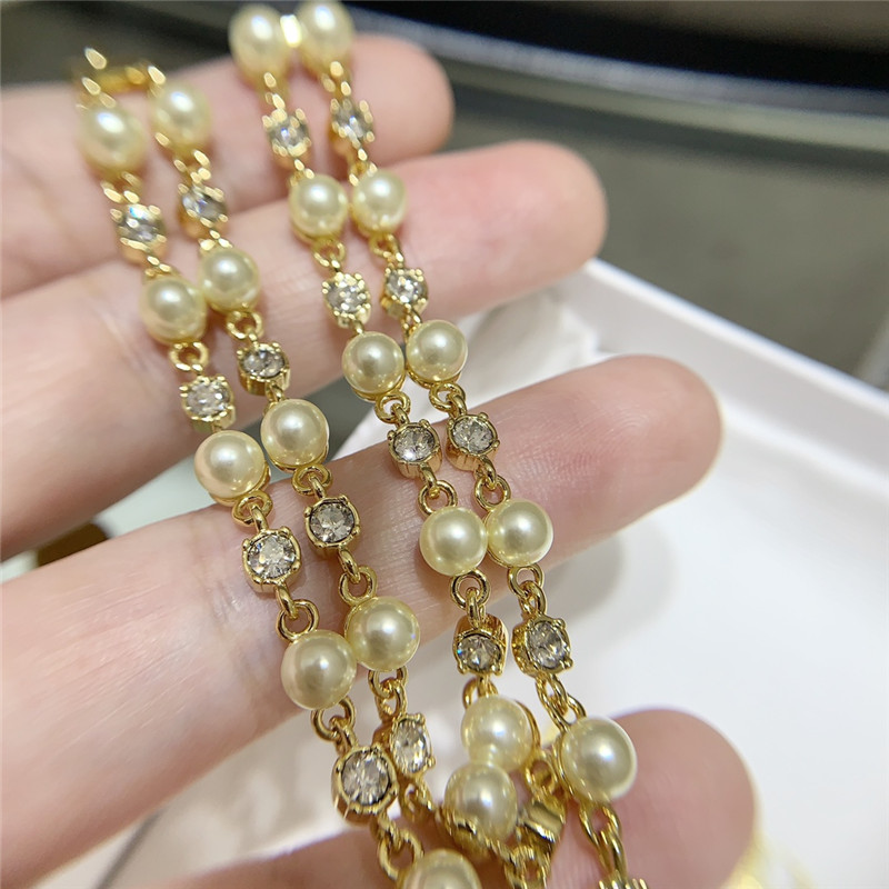 D10r pearl crystal cd necklace