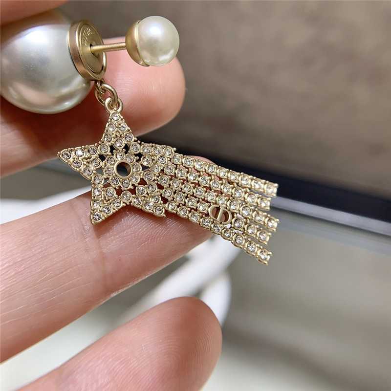 D10r pearl shooting star earrings