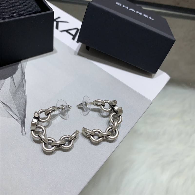 Ch**el double c curved hook hollow small earrings