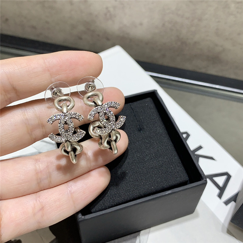 Ch**el double c curved hook hollow small earrings