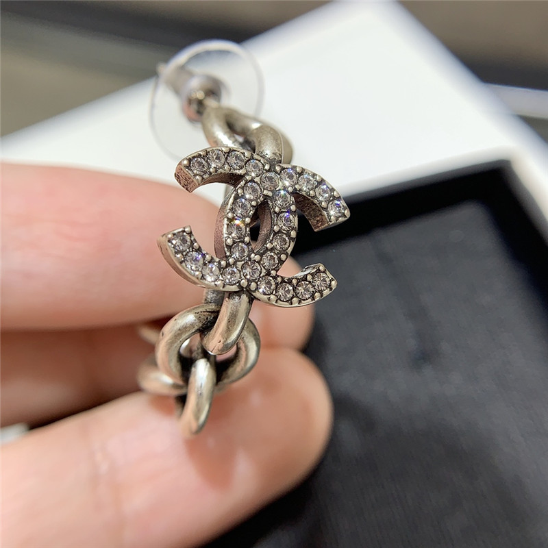 Ch**el double c curved hook hollow small earrings