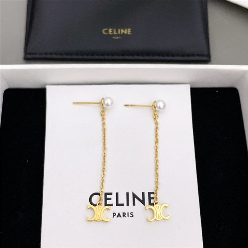 Ce1i*e double chain arc de triomphe hanging bead earrings