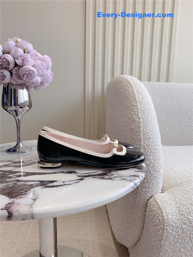 Roger Vivier Viv’ Podium Ballerinas in Patent Black and White