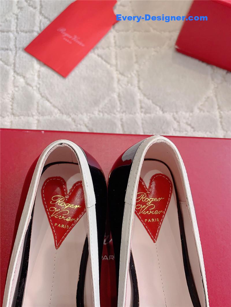 Roger Vivier Viv’ Podium Ballerinas in Patent Black and White