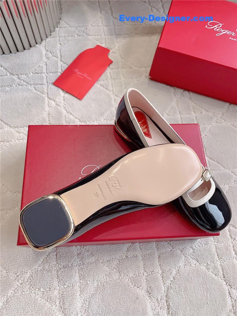 Roger Vivier Viv’ Podium Ballerinas in Patent Black and White