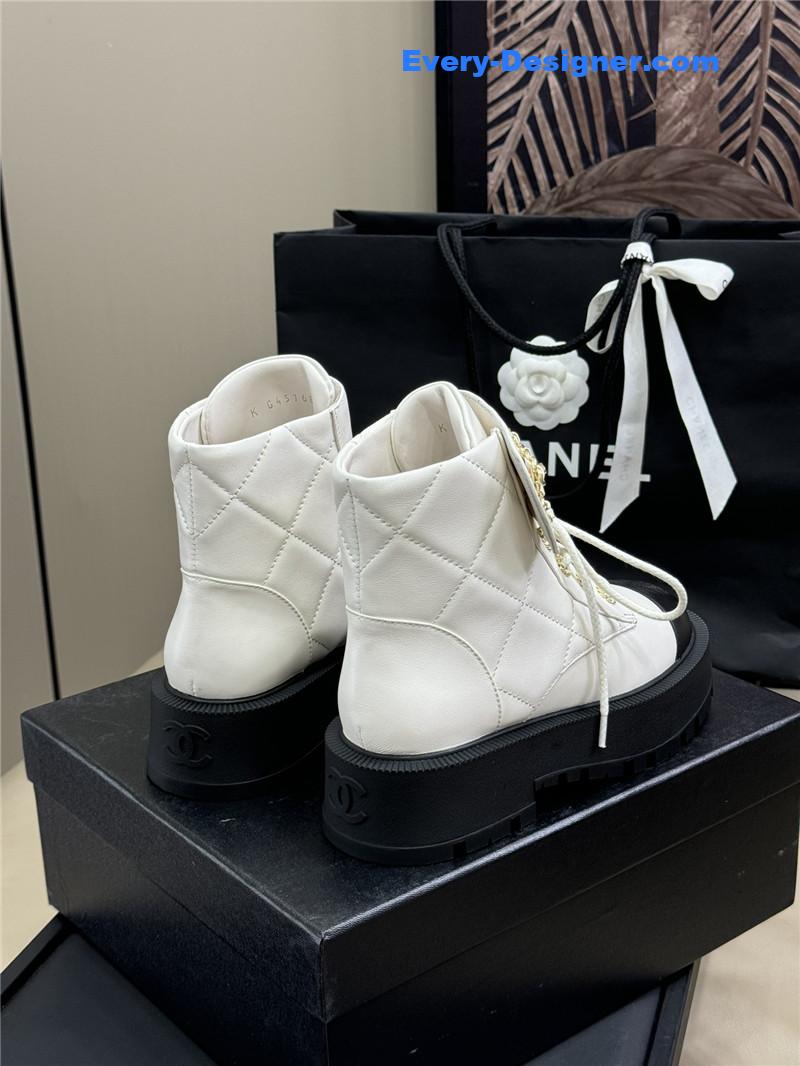 Ch**el combat ankle boots in white