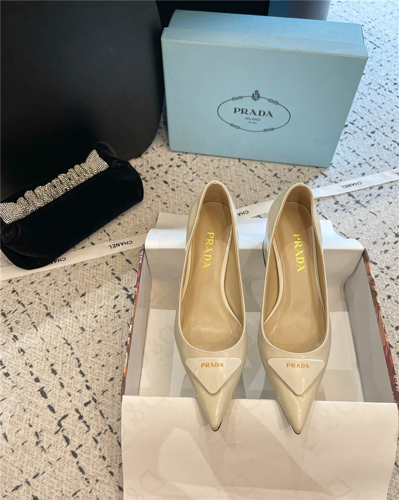 Pra*a triangle logo ivory brushed leather pumps