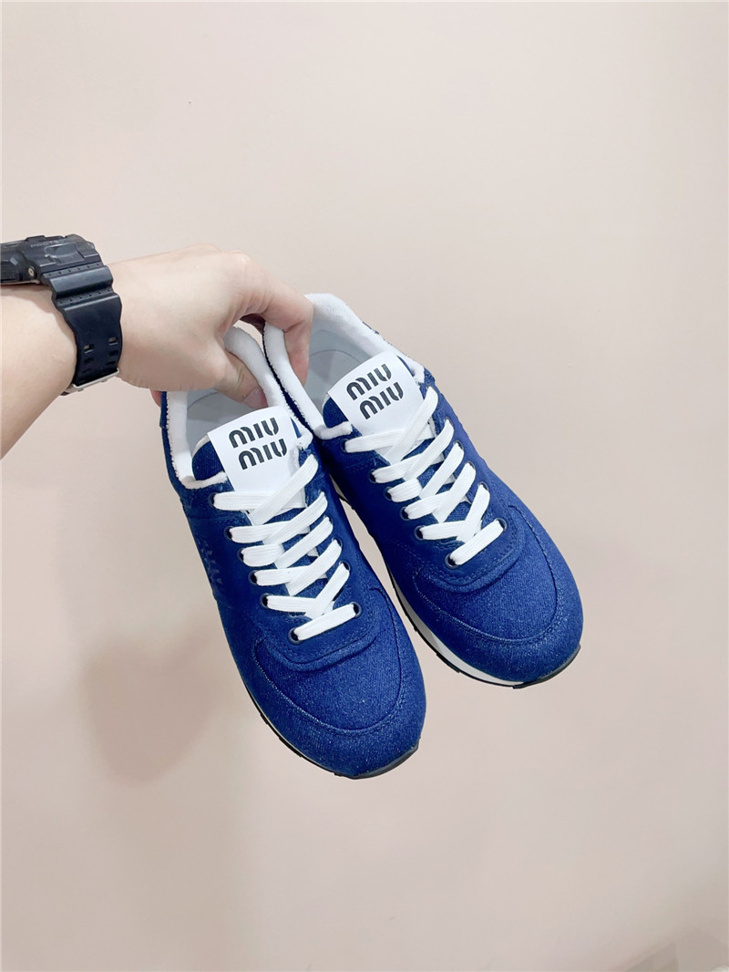 Miu Miu x New Balance 574 Leather Sneakers in Blue