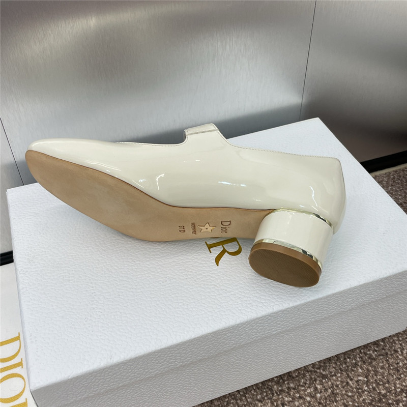 D10r miss D10r strap pumps ivory patent calfskin