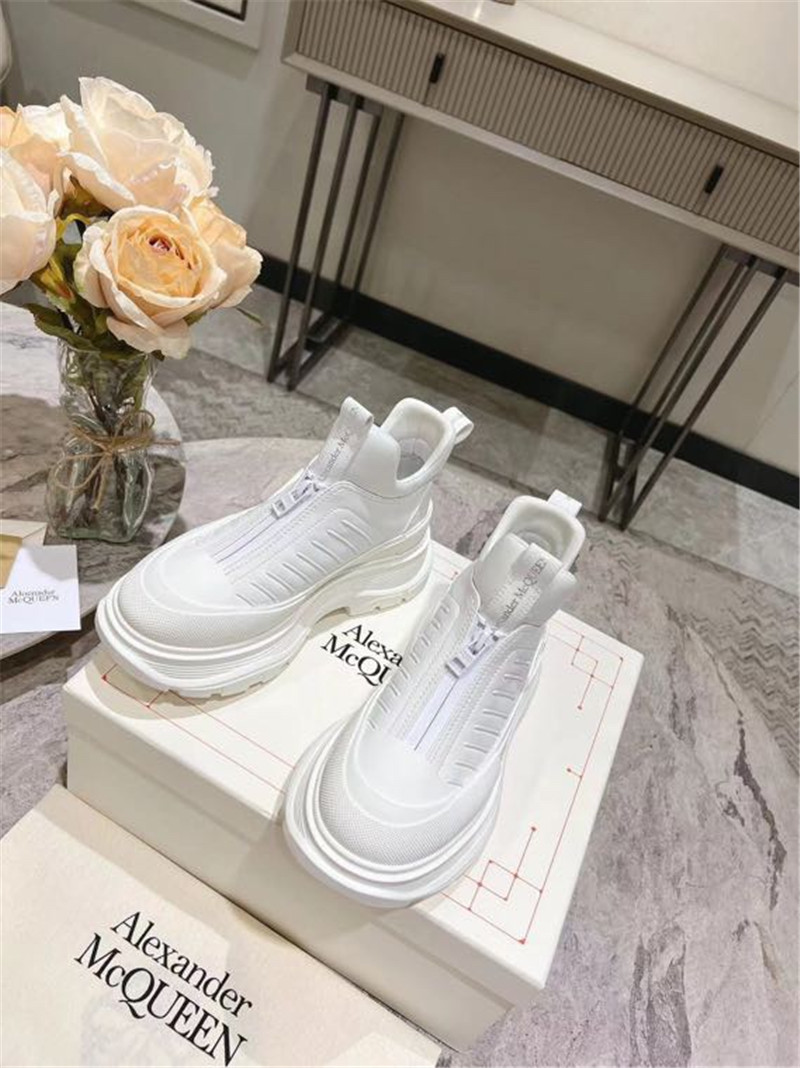 a1exa*der Mcqv*en white zip-up low top sneakers