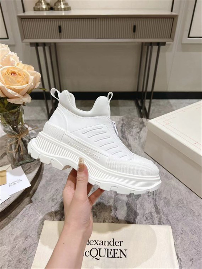 a1exa*der Mcqv*en white zip-up low top sneakers