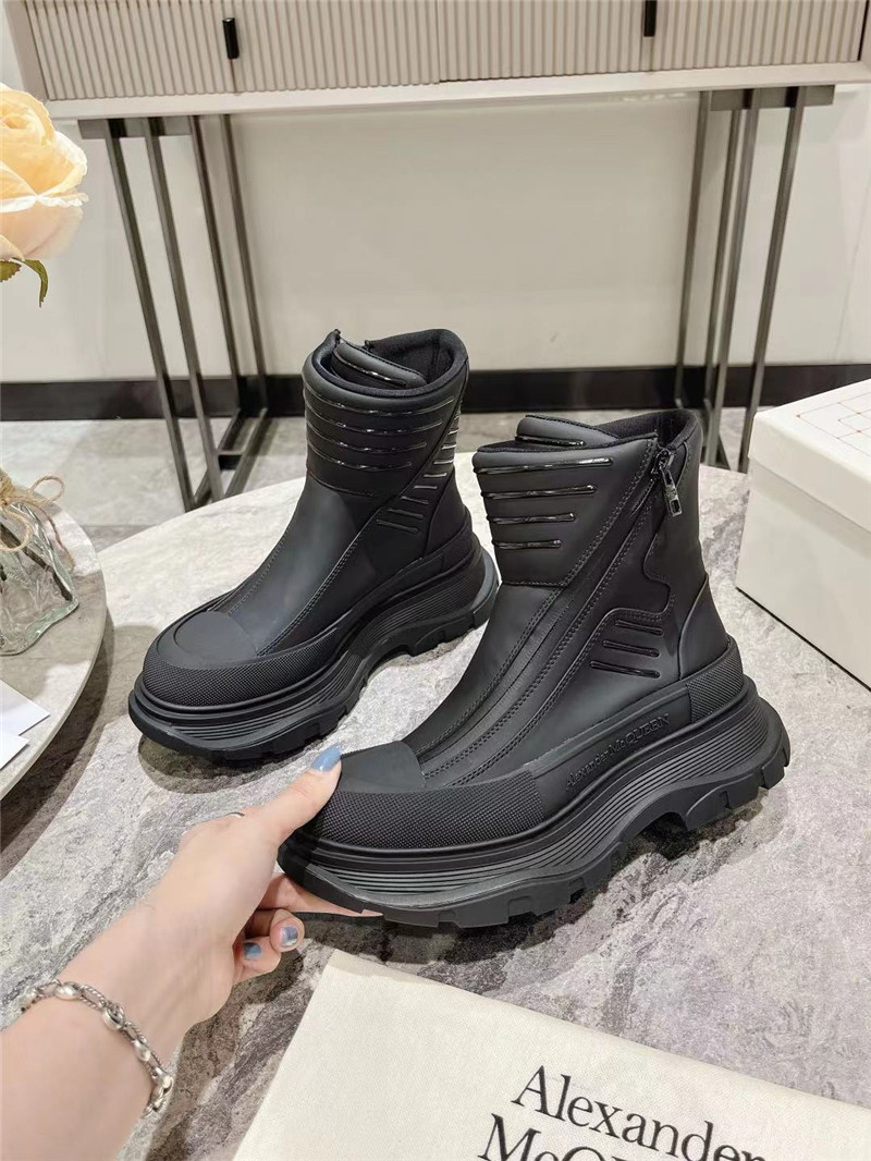 a1exa*der Mcqv*en black tread slick high top sneakers