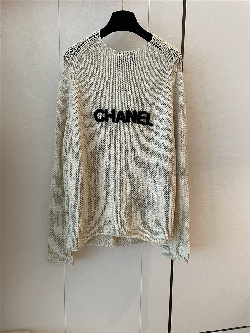 Ch**el logo applique rib-knit sweater in off-white