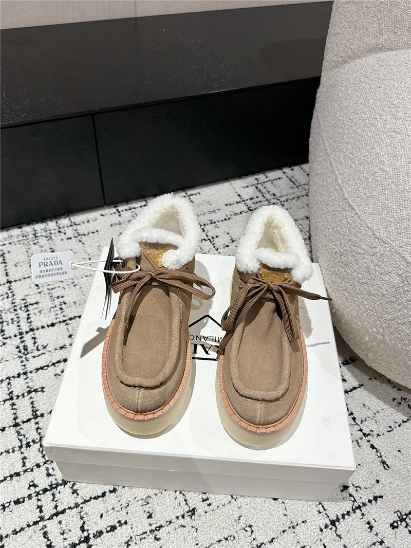 Pra*a beige suede shearling platform ankle boots