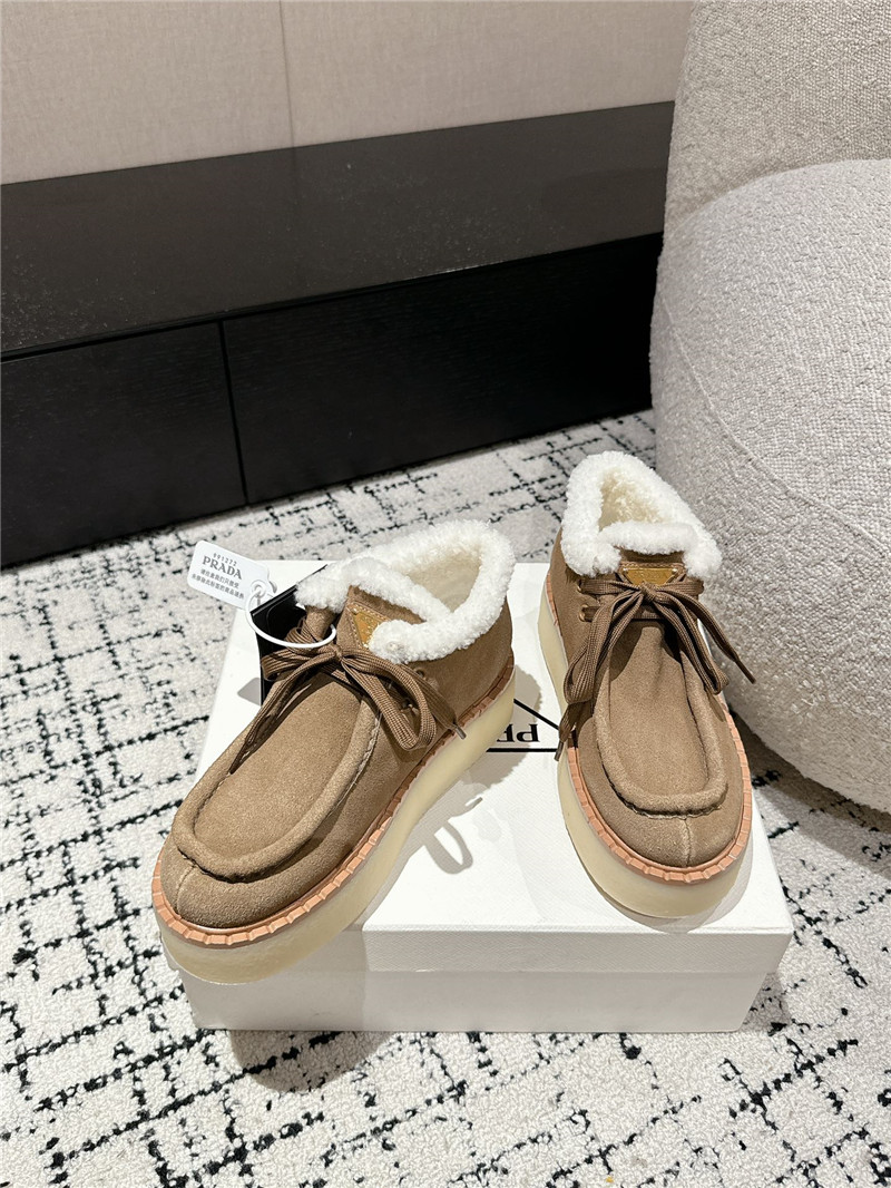 Pra*a beige suede shearling platform ankle boots