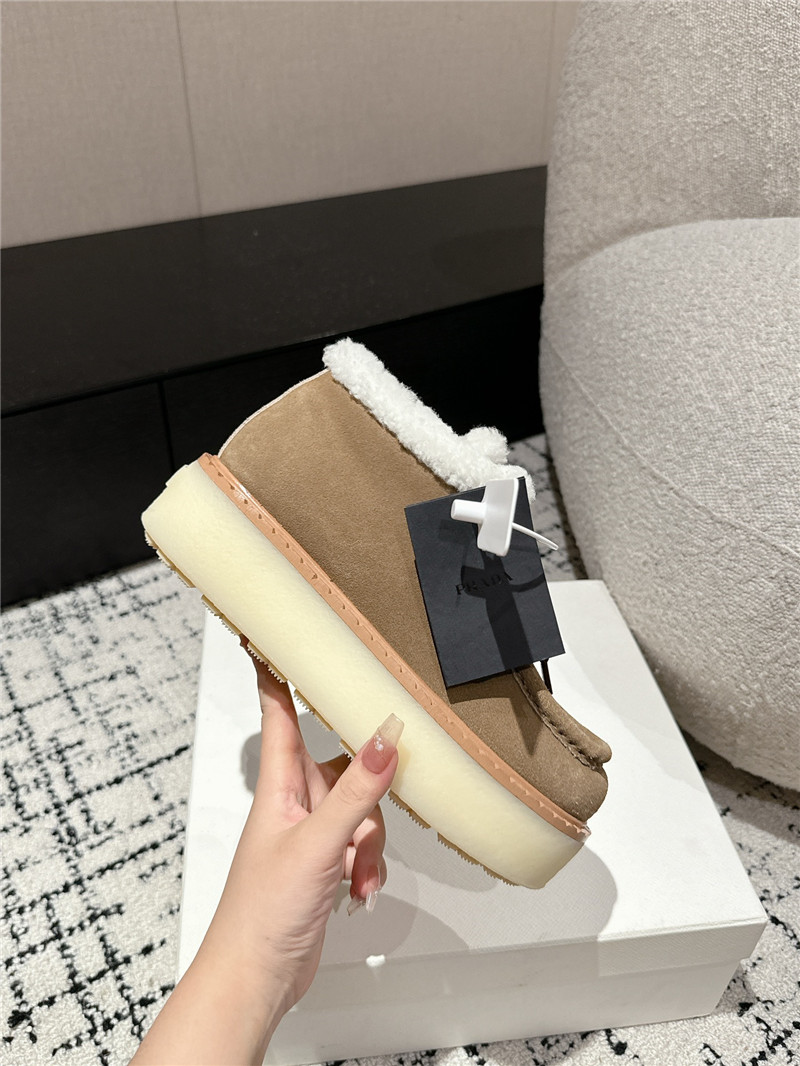 Pra*a beige suede shearling platform ankle boots