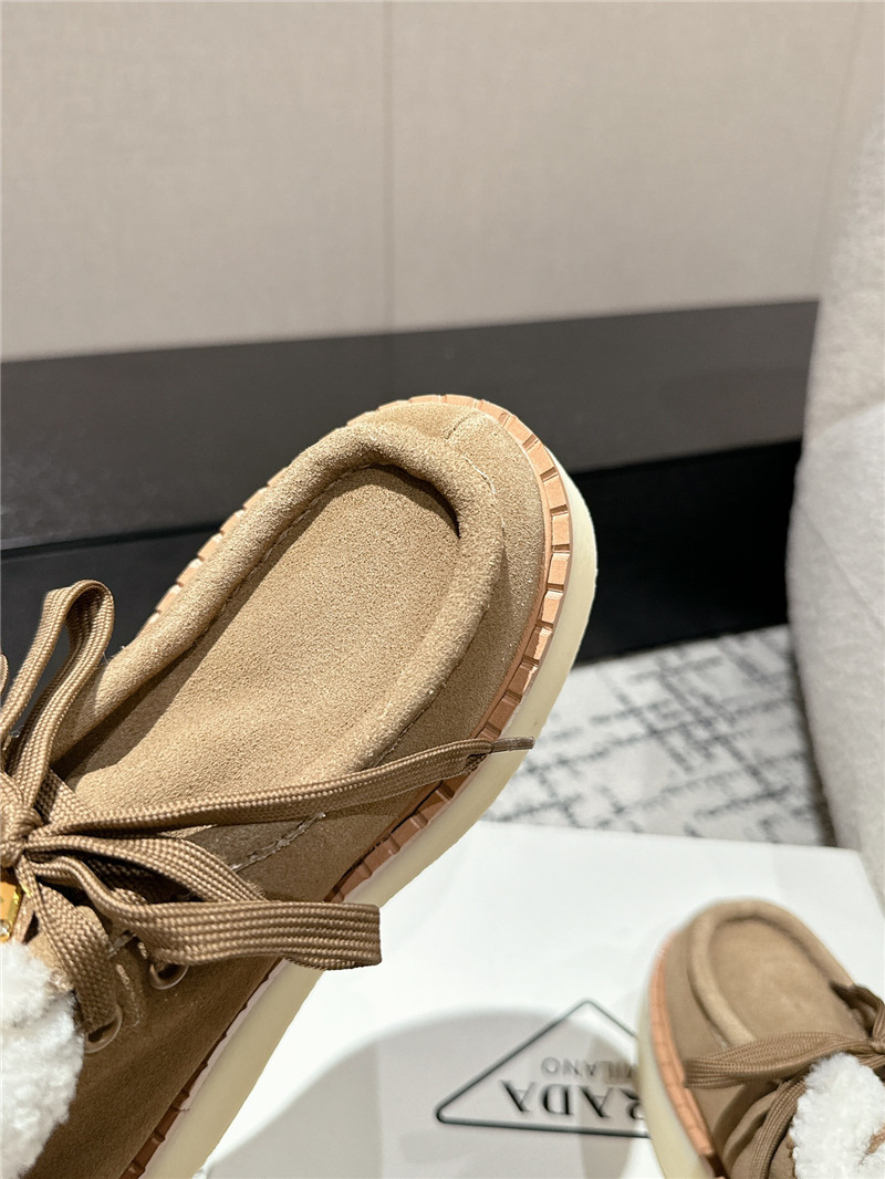 Pra*a beige suede shearling platform ankle boots