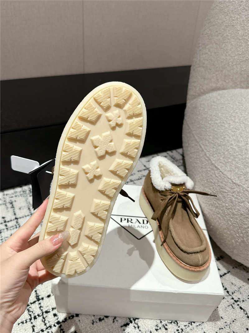 Pra*a beige suede shearling platform ankle boots