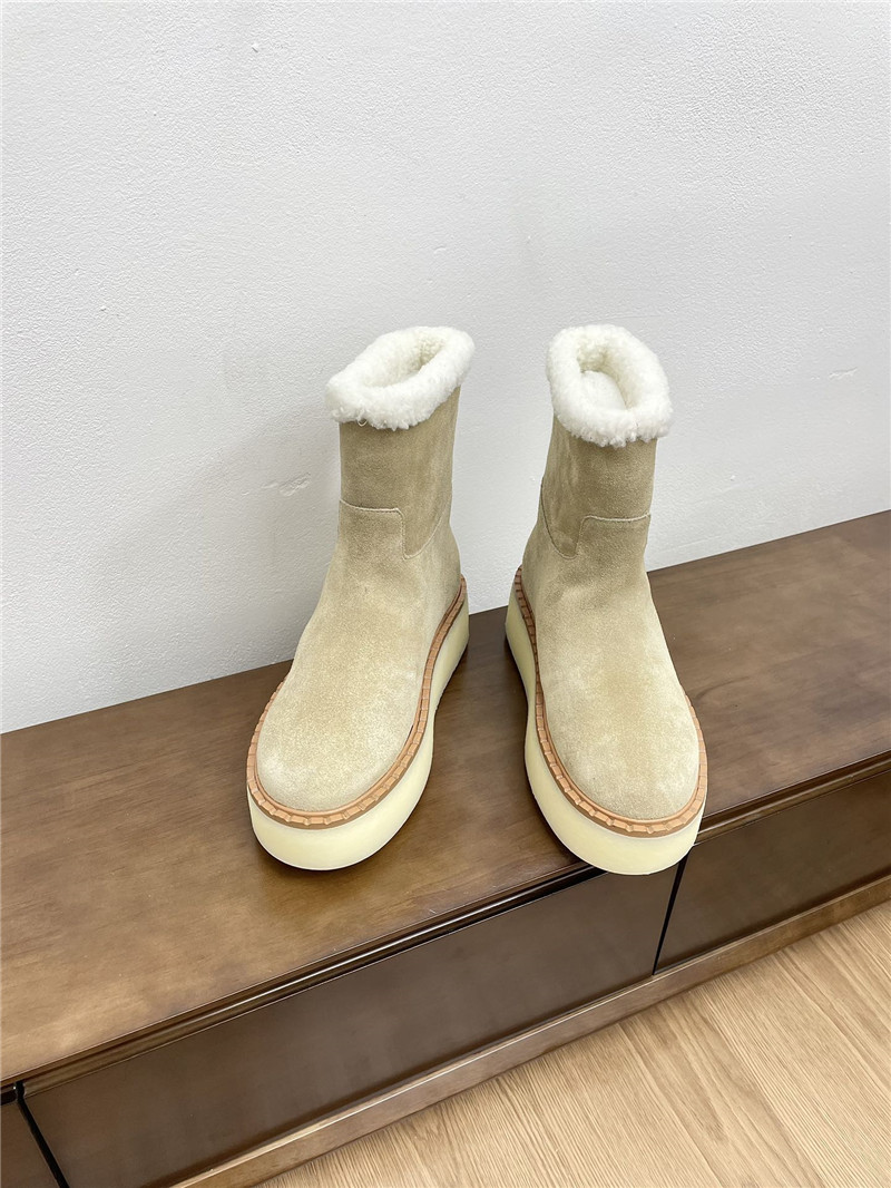 Pra*a triangle-logo platform beige suede boots