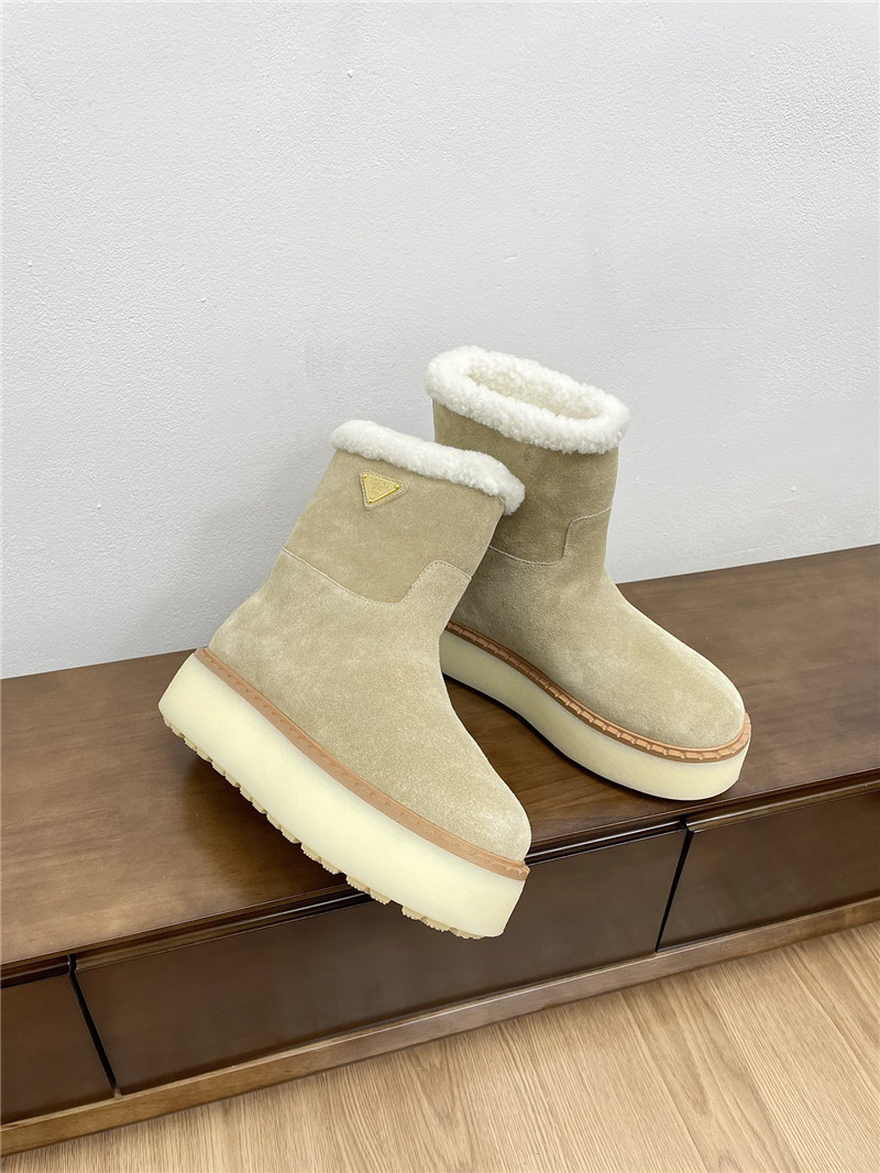 Pra*a triangle-logo platform beige suede boots