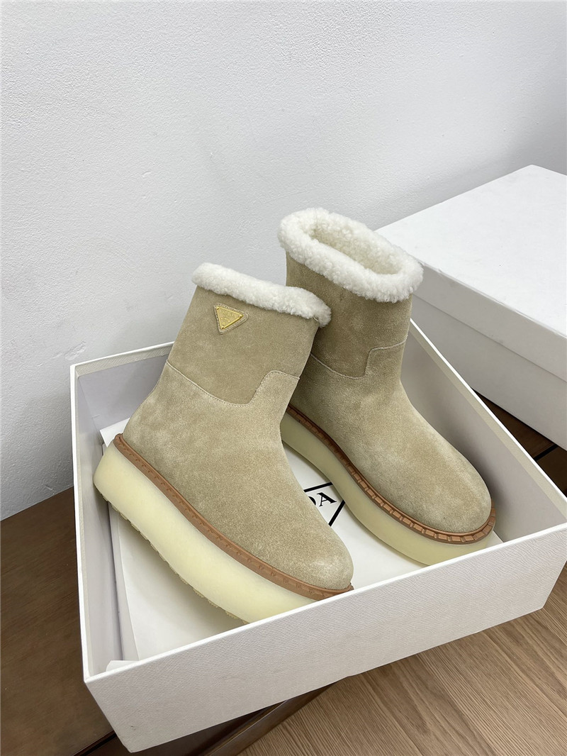 Pra*a triangle-logo platform beige suede boots