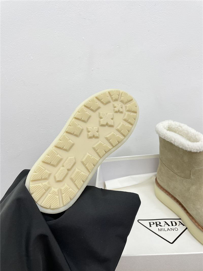 Pra*a triangle-logo platform beige suede boots
