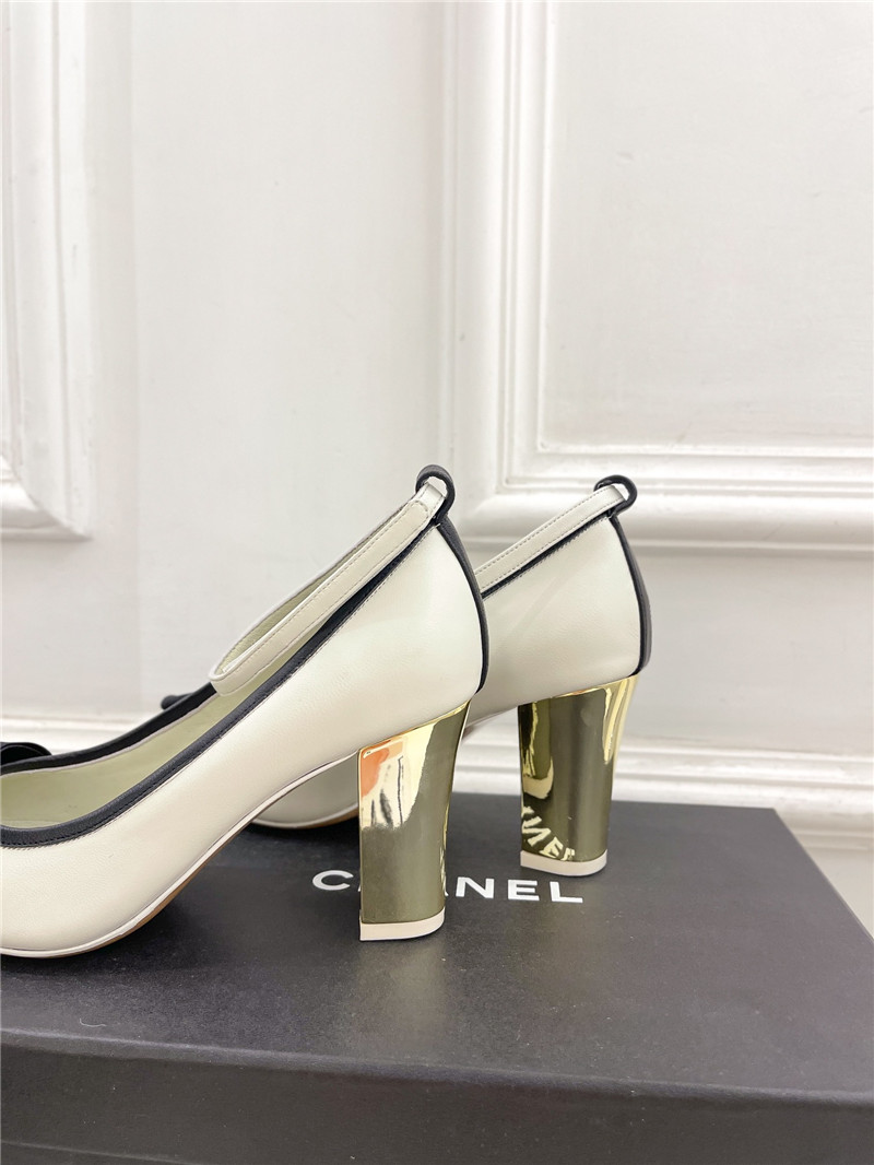 Ch**el bow mary jane heel pumps in white calfskin
