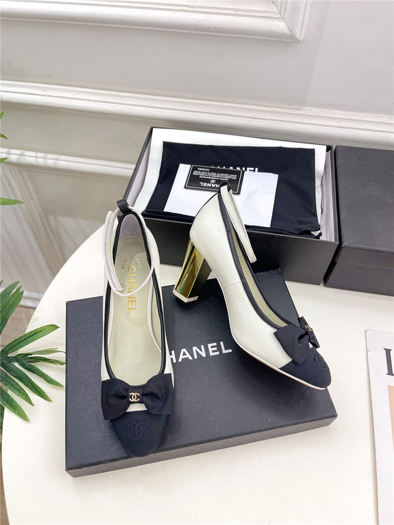 Ch**el bow mary jane heel pumps in white calfskin