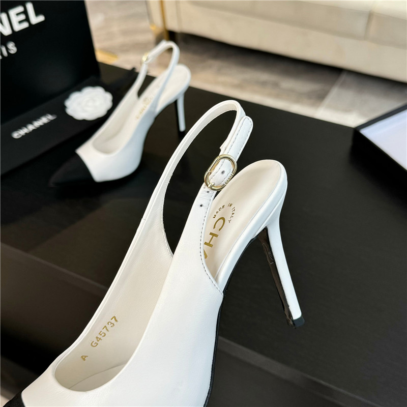 Ch**el pointed heel slingbacks in ivory/black calfskin