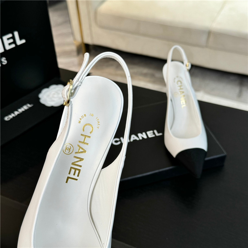 Ch**el pointed heel slingbacks in ivory/black calfskin