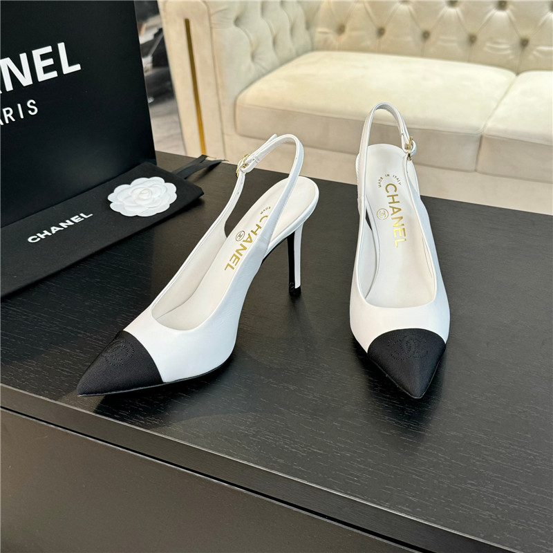 Ch**el pointed heel slingbacks in ivory/black calfskin