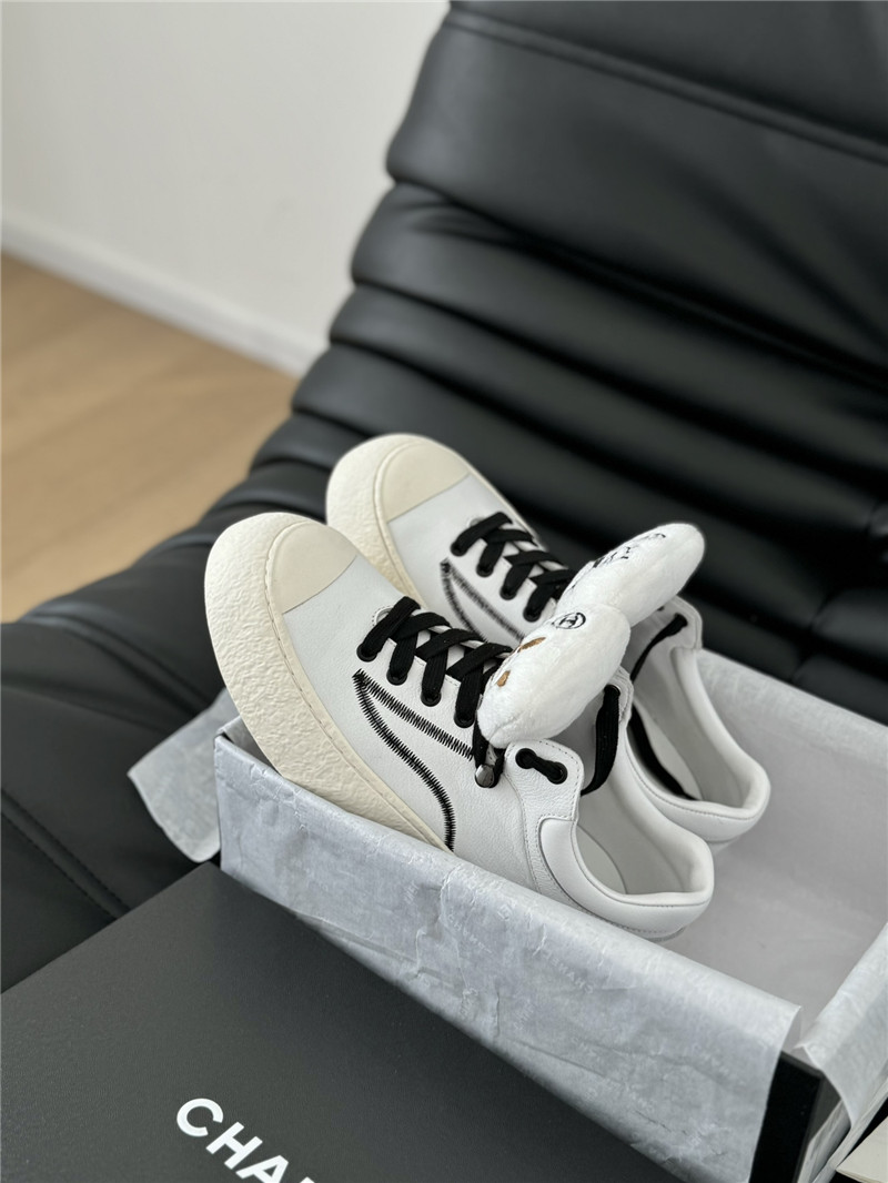 Ch**el white lace-up low top sneakers