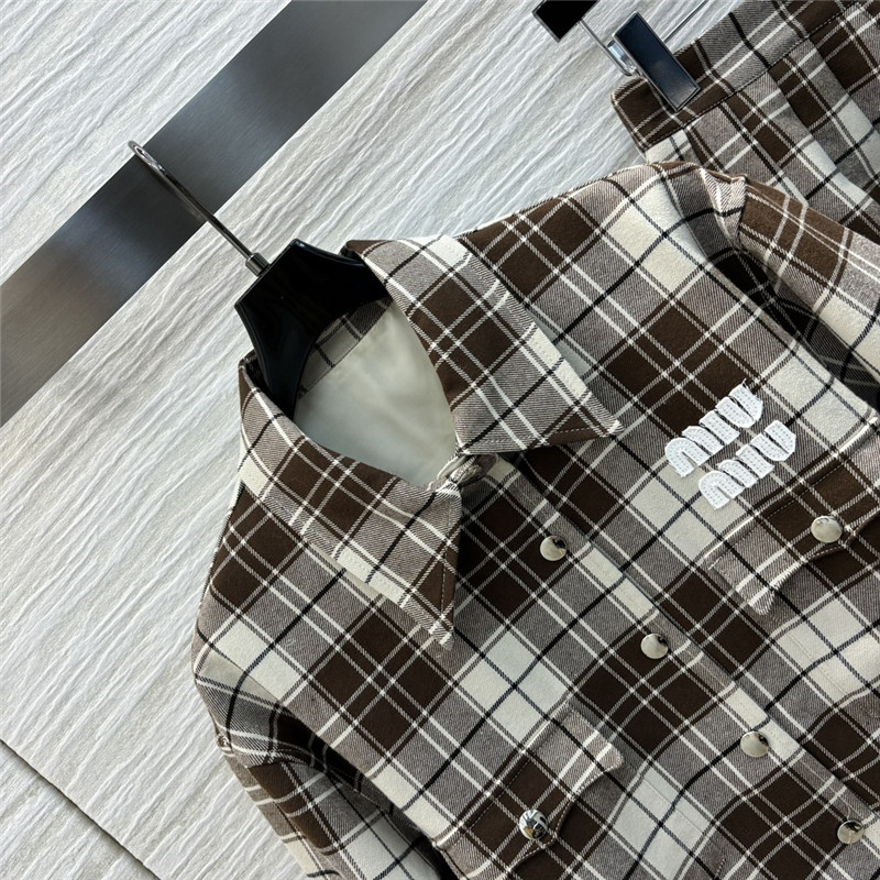 M1um1u jacket + leather button pleated skirt