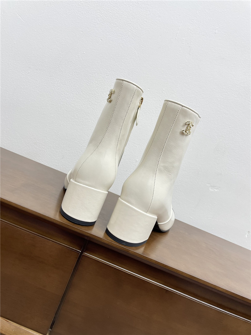 Ch**el calfskin block heel round toe ankle boots