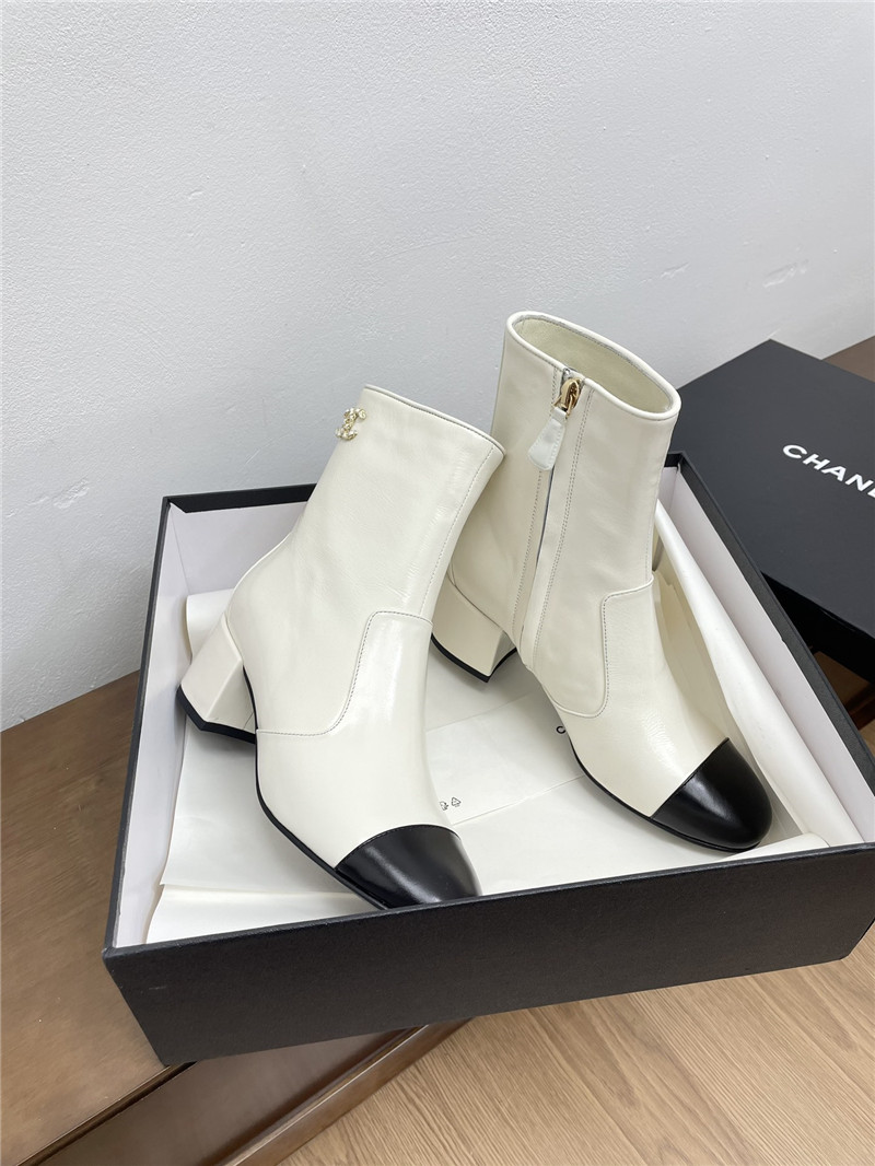 Ch**el calfskin block heel round toe ankle boots