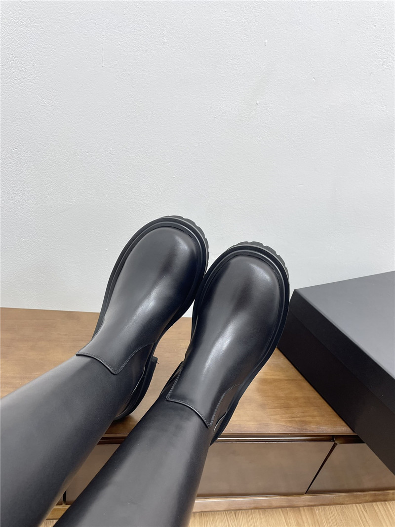 Ch**el calfskin zippered knee-high boots