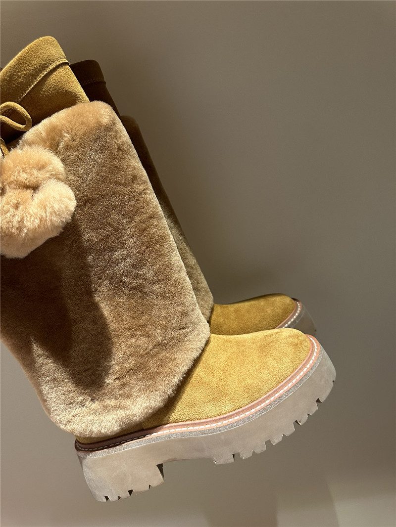 Ce1i*e bulky high boot with triomphe tassels