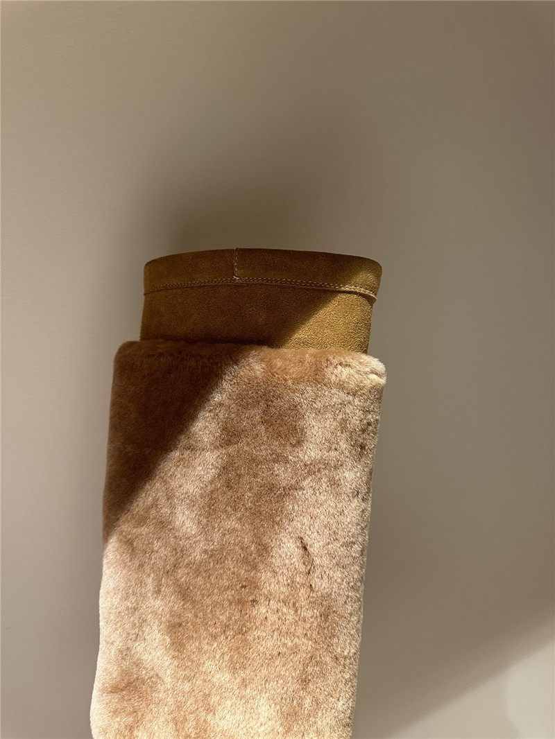 Ce1i*e bulky high boot with triomphe tassels