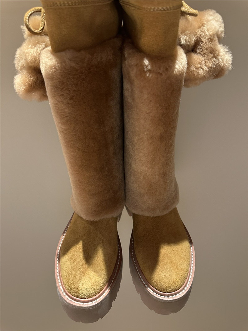 Ce1i*e bulky high boot with triomphe tassels