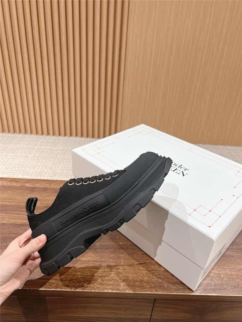 a1exa*der Mcqv*en black tread slick low top sneakers
